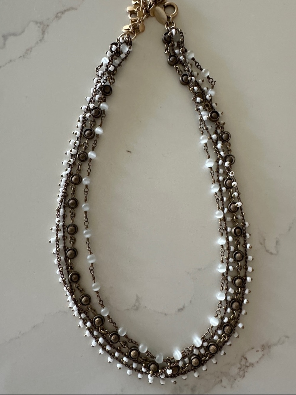 La vie of Paris Multi-Strand White Bead Necklace with Antique Metal Accents